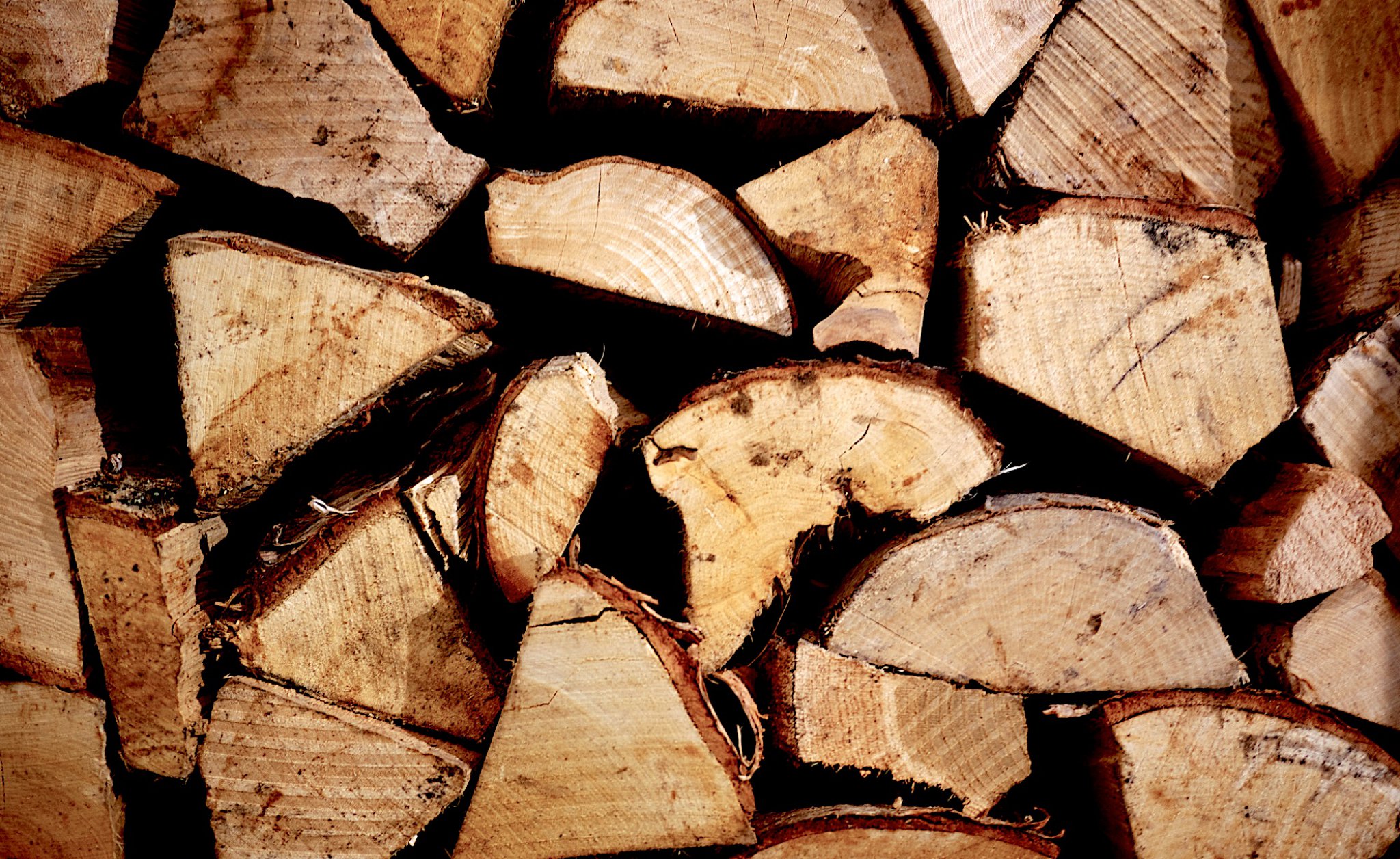 Image showing kiln dried logs stacked in a pile